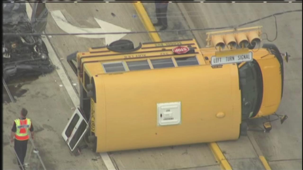 School bus flips on side in southwest Harris County