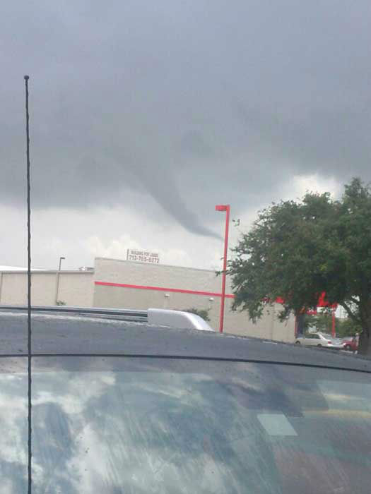 Funnel cloud forms in Texas City sky
