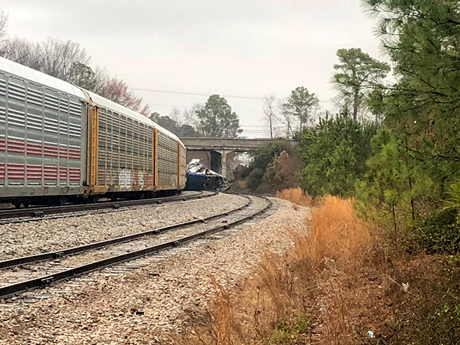 <div class='meta'><div class='origin-logo' data-origin='AP'></div><span class='caption-text' data-credit=''>A derailed Amtrak train sits on the track in Cayce, S.C., Sunday, Feb. 4, 2018. (AP Photo/Meg Kinnard)</span></div>