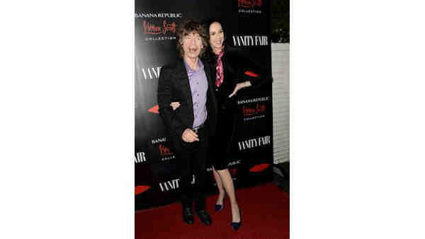 Fashion Designer L'Wren Scott, pictured here with partner Mick Jagger, died Mar. 17, 2014. She was 49. <span class=meta>Photo by Dan Steinberg/Invision/AP, File</span>