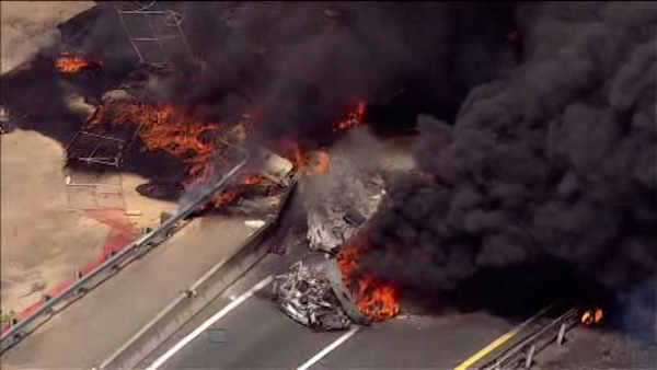 A tanker truck overturned and caught fire Tuesday on the New Jersey Turnpike in Woodbridge. <span class=meta></span>
