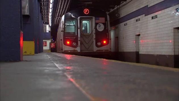 Subway rider dragged to death after caught in F train doors in Queens