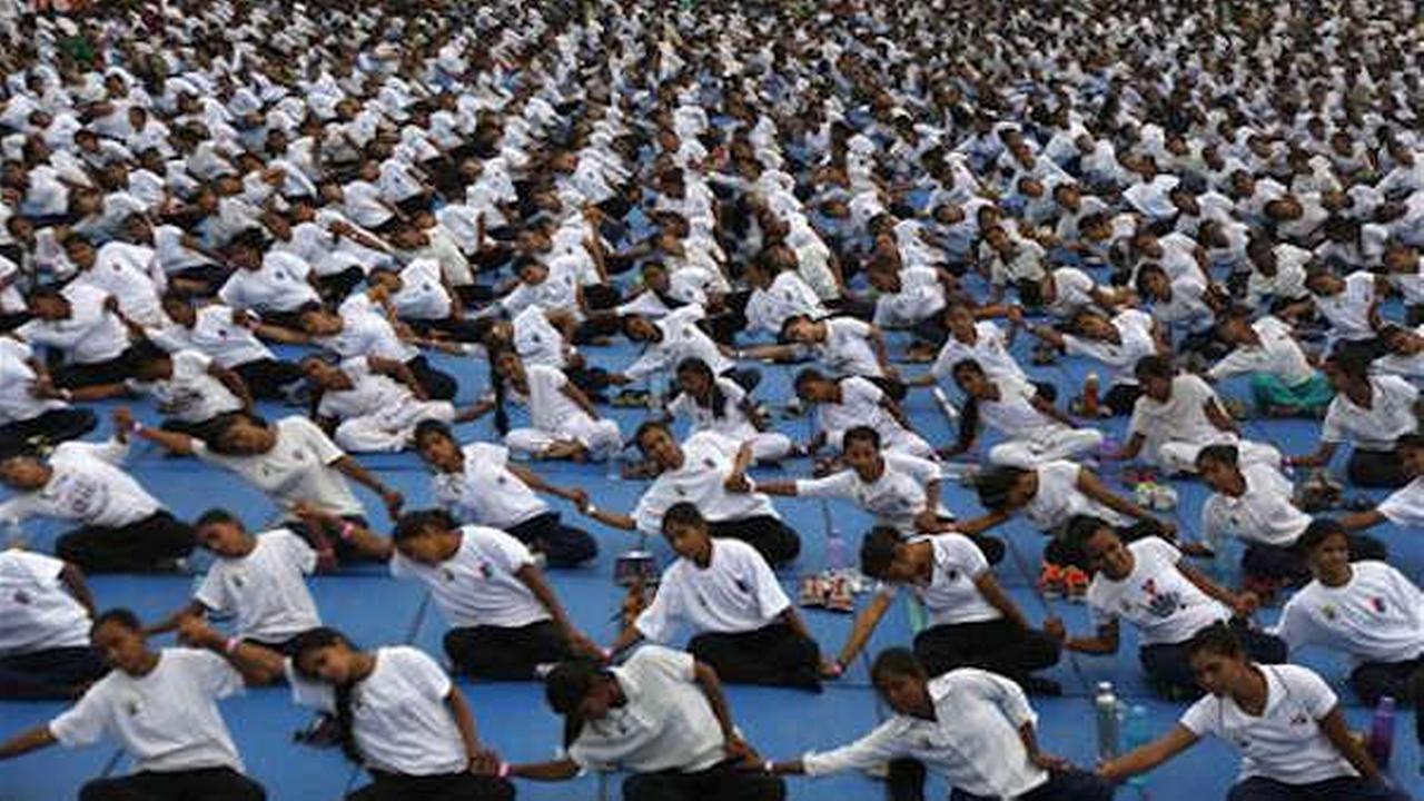 Millions exercise together for International Yoga Day