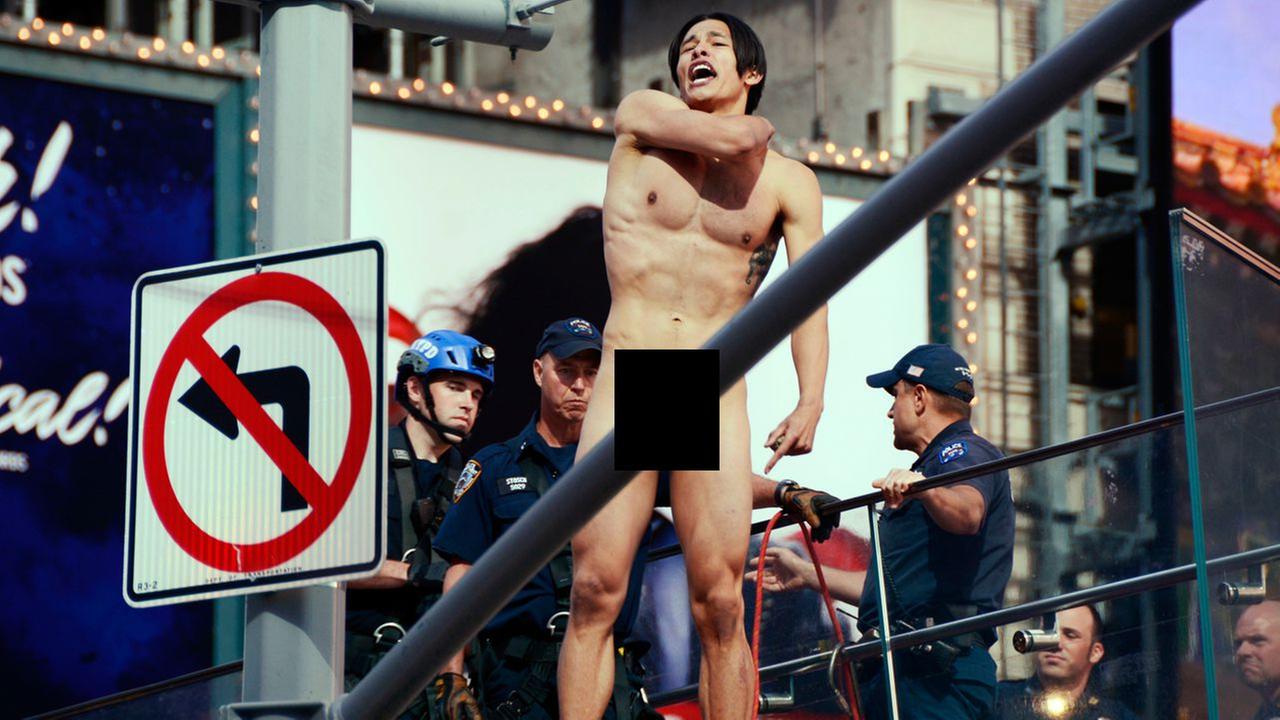Naked Emotionally Disturbed Man Stands Off With Nypd Atop Tkts Booth