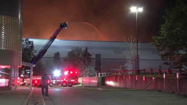 A six-alarm fire burned through a Fishkill warehouse that serves as the Gaps regional distribution center.
