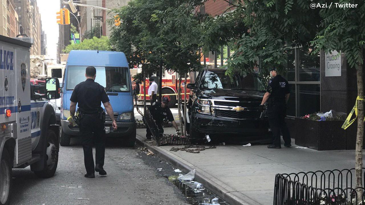 Vehicles collide, SUV jumps curb, hits pedestrians
