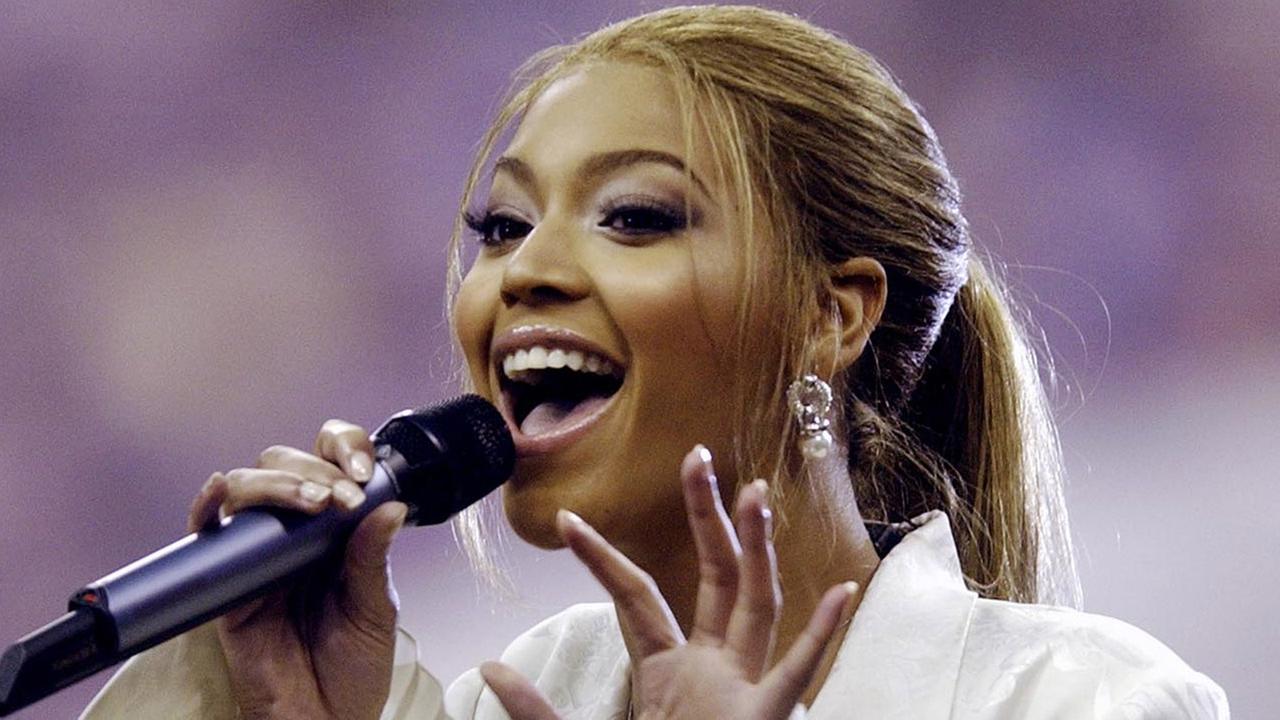 Entertainer Beyonce Knowles sings the national anthem before Super Bowl XXXVIII on Sunday, Feb. 1, 2004, at Reliant Stadium in Houston.