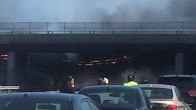 Overturned, fully-engulfed dump truck shuts down New Jersey Turnpike in Linden