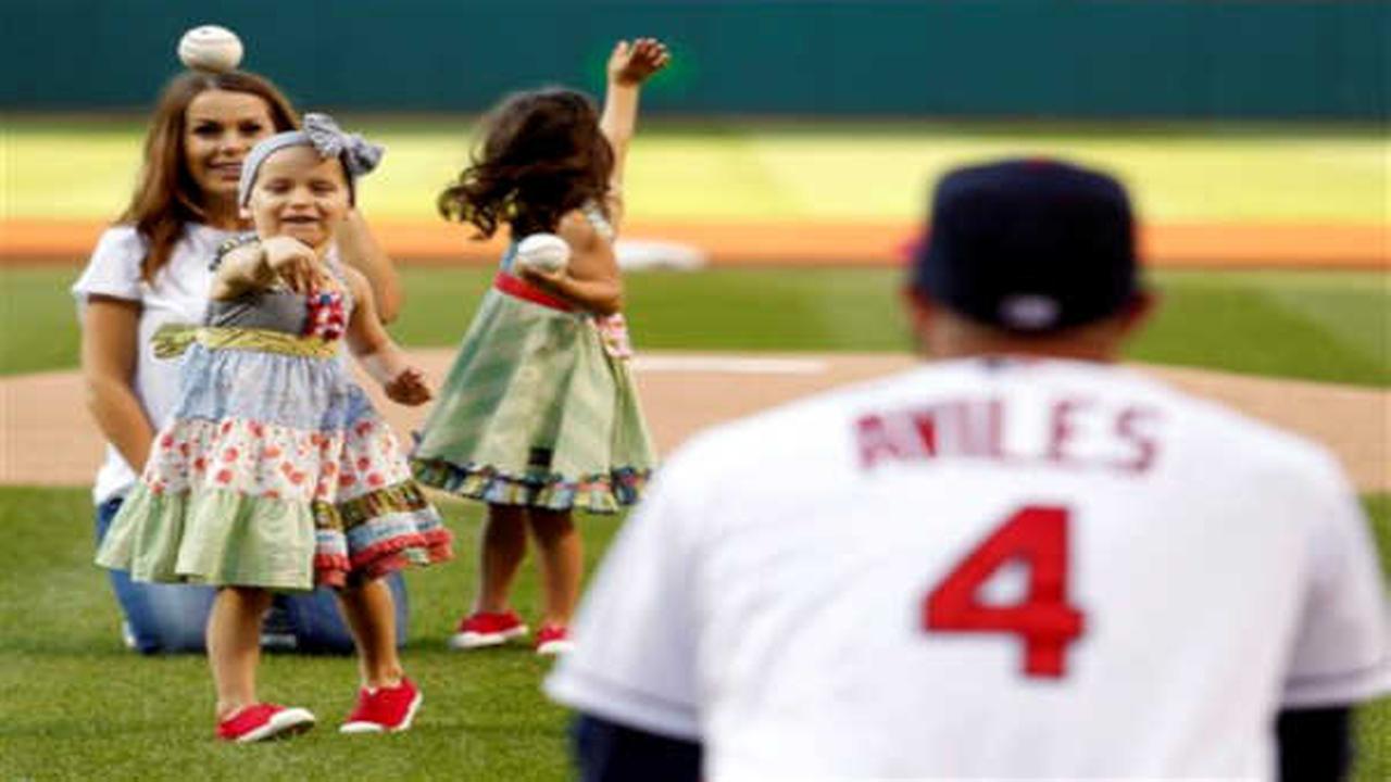 Indians infielder Mike Aviles&#39 daughter throws out 1st pitch with sister amid leukemia fight