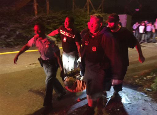 <div class='meta'><div class='origin-logo' data-origin='none'></div><span class='caption-text' data-credit='AP Photo/ Paul Cheung'>A passenger is carried following an Amtrak train crash Tuesday, May 12, 2015, near Philadelphia. Train 188 was traveling from Washington to New York City. (AP Photo/Paul Cheung)</span></div>