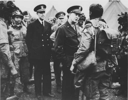 <div class="meta image-caption"><div class="origin-logo origin-image none"><span>none</span></div><span class="caption-text">Supreme Commander Dwight Eisenhower visits paratroopers of the 101st Airborne Division, three hours before the D-Day invasion (AP Photo/ ANONYMOUS)</span></div>