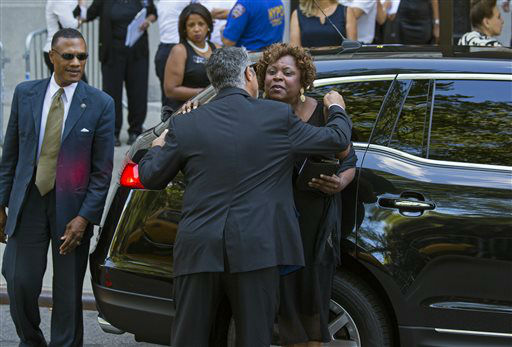 Radio personality Robin Quivers, right, arrives at a funeral service for comedian Joan Rivers at Temple Emanu-El in New York Sunday (AP Photo/Craig Ruttle) <span class=