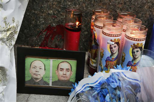 Candlelight vigil held for slain New York Police Department.