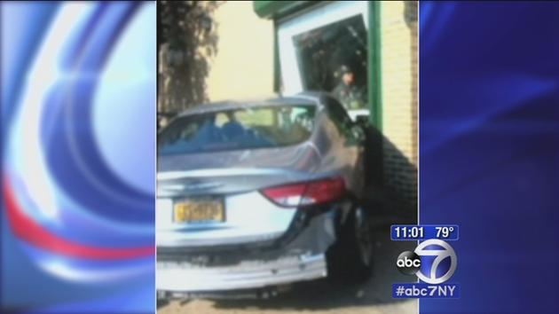 3 injured when car slams into Queens bar