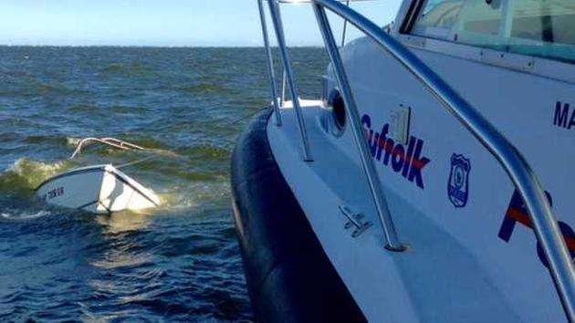 Family rescued after boat sinks