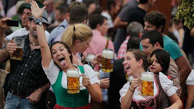 Young women celebrate the opening of the 181st Oktoberfest beer festival in Munich, southern Germany, Saturday, Sept. 20. <span class=meta>(AP Photo/Matthias Schrader)</span>