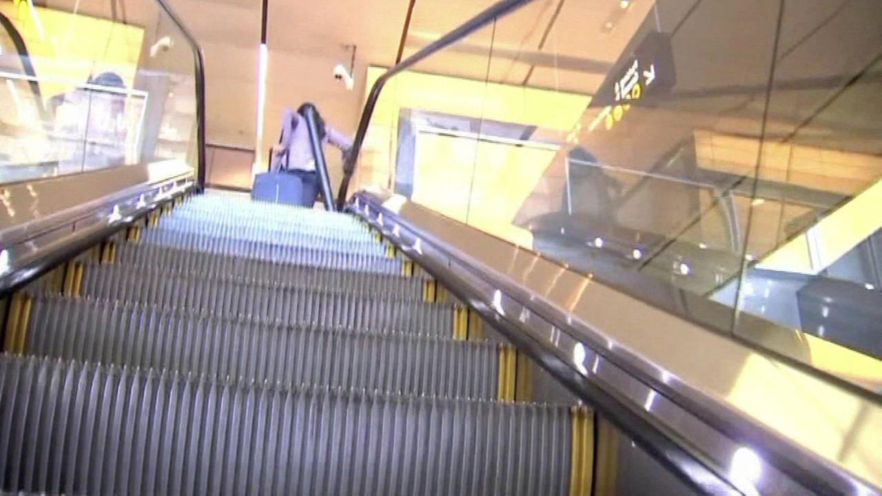 escalator stairs upskirt naked curly haired brunette