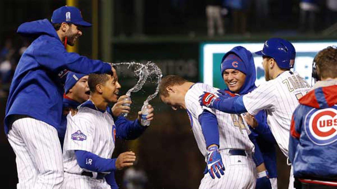 World Series champion Chicago Cubs win home opener; Schwarber, Baez