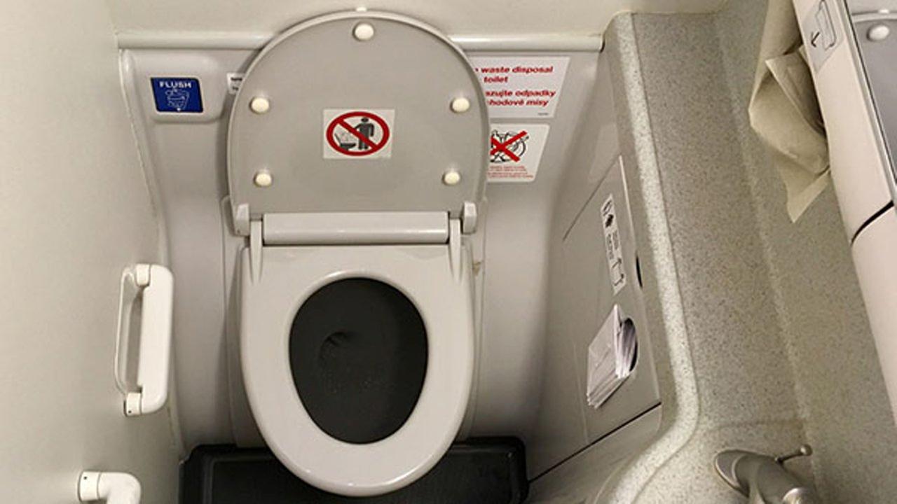 Photo of a lavatory in commercial airplane.