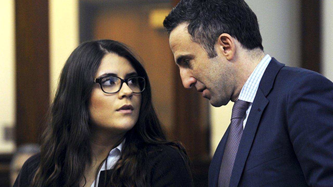 In this March 3, 2017 photo, Nikki Yovino, left, appears with her attorney Mark Sherman as she is arraigned in Bridgeport Superior Court, in Bridgeport, Conn. 