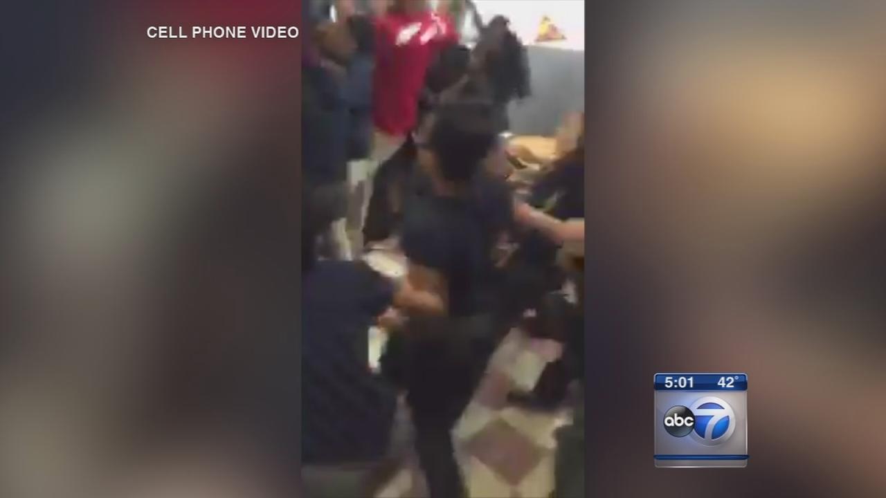 3 sisters among 14 girls suspended after school fight caught on video
