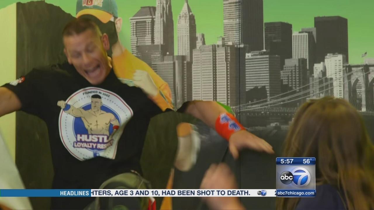 Watch: Wrestler John Cena pops out of wall, surprises fans
