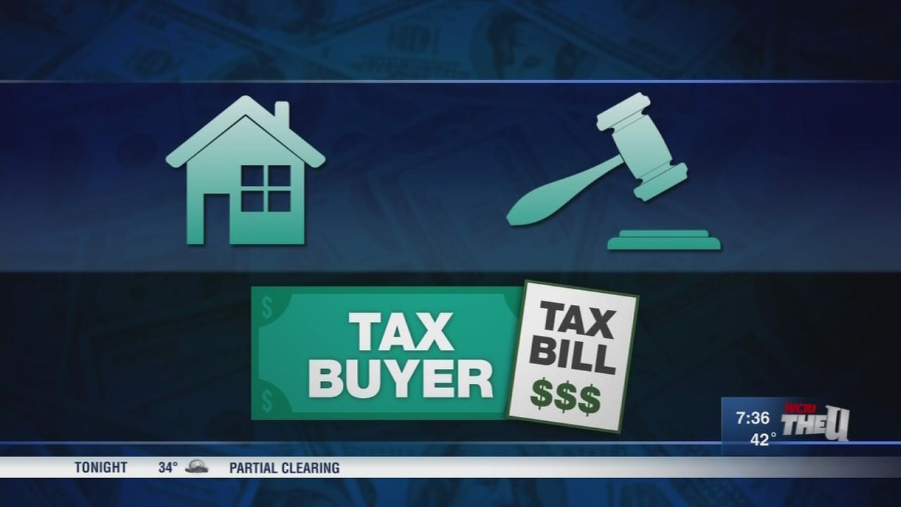 Where do you find houses up for auction because of back taxes?