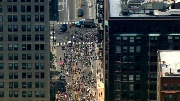 <div class='meta'><div class='origin-logo' data-origin='WLS'></div><span class='caption-text' data-credit='WLS'>Thousands marched in downtown Chicago Saturday afternoon to protest President Donald Trump's immigration policy.</span></div>