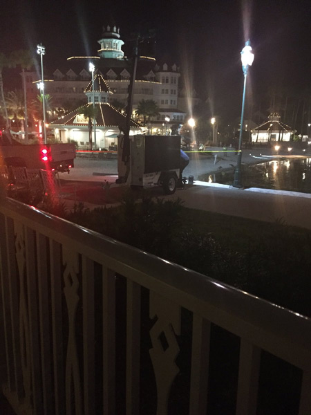 <div class='meta'><div class='origin-logo' data-origin='none'></div><span class='caption-text' data-credit='Twitter/ Katherine Popp'>Authorities search for a child who was dragged into the water by an alligator near Disney's Grand Floridian Resort & Spa in Orlando.</span></div>