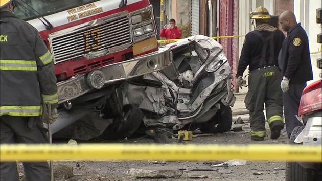 Photos of an accident in West Philadelphia involving a fire truck. <span class=meta></span>