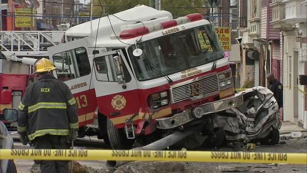 Photos of an accident in West Philadelphia involving a fire truck. <span class=meta></span>