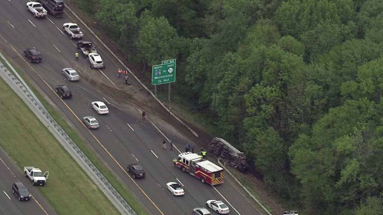Dump truck flips in multivehicle crash on I295