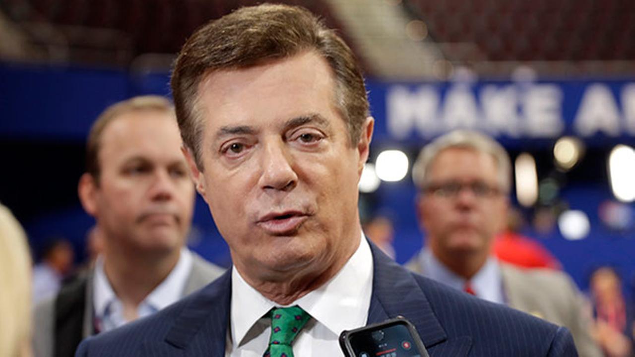 FILE - In this July 17, 2016 file photo, Trump Campaign Chairman Paul Manafort talks to reporters on the floor of the Republican National Convention.