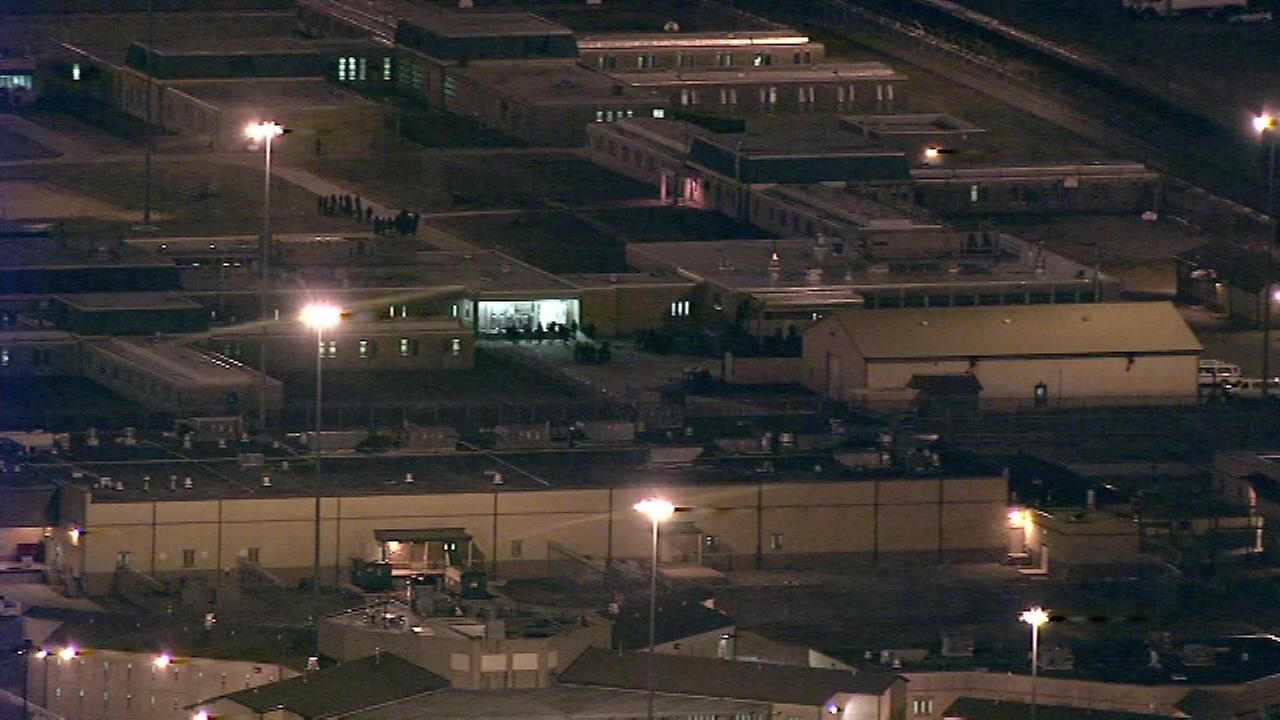 1 hostage dead, another alert and talking, Delaware prison officials say