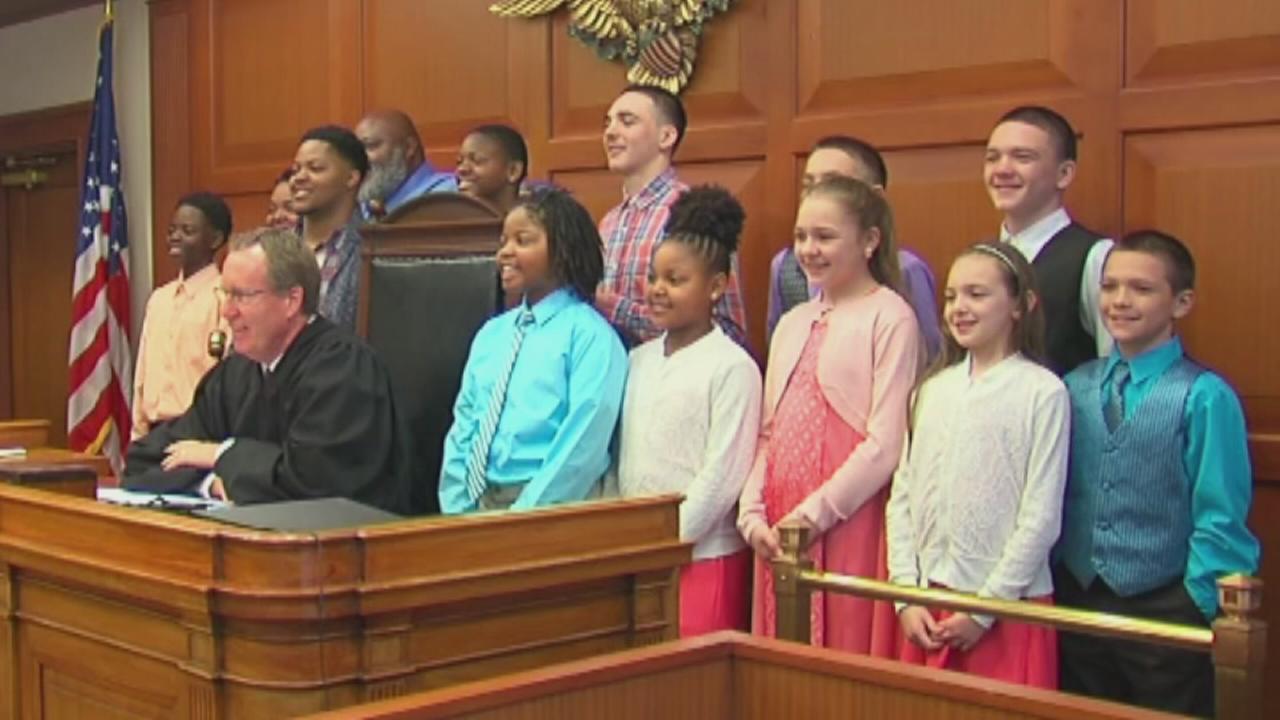 Image for Family with 5 children adopts 6 foster children siblings