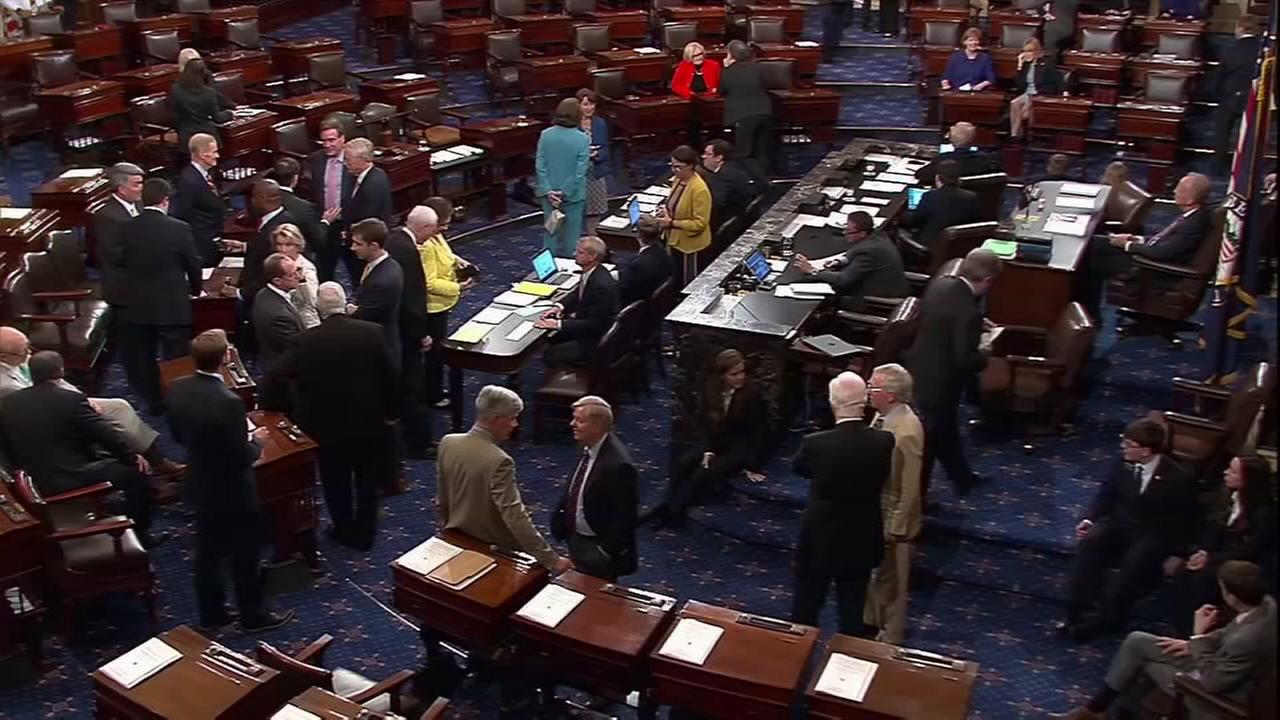 Facing defections, Senate GOP leaders delay health care vote