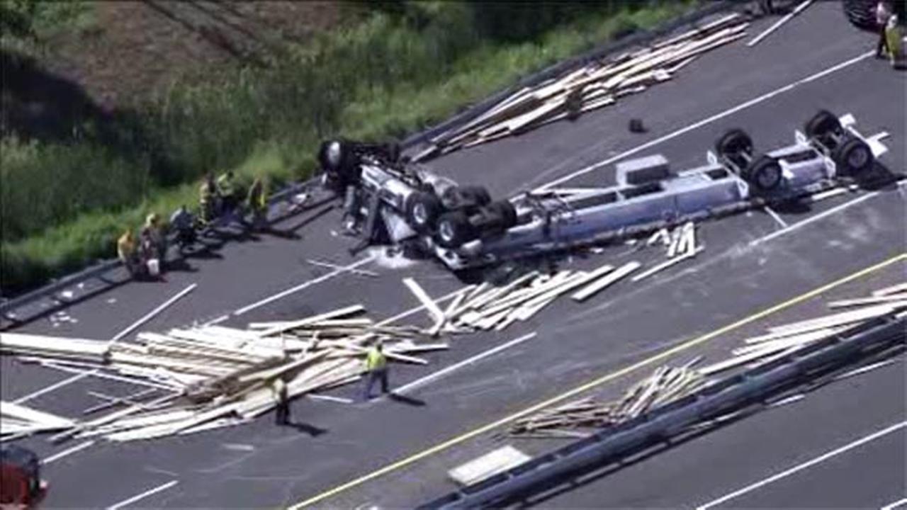 Overturned rig spills load of lumber on NJ Turnpike in Burlington