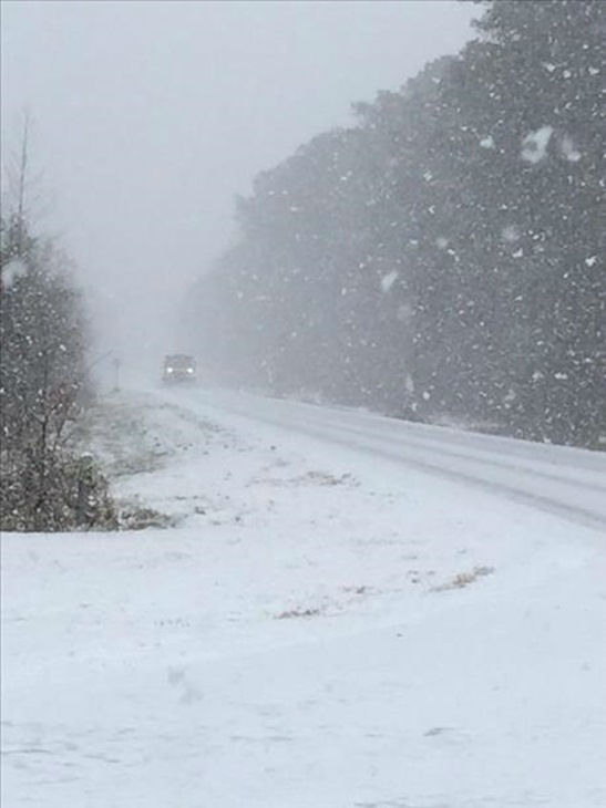 Schools close as snow falls across North Carolina widespread