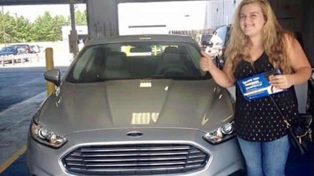 Allison Cope pictured with he car