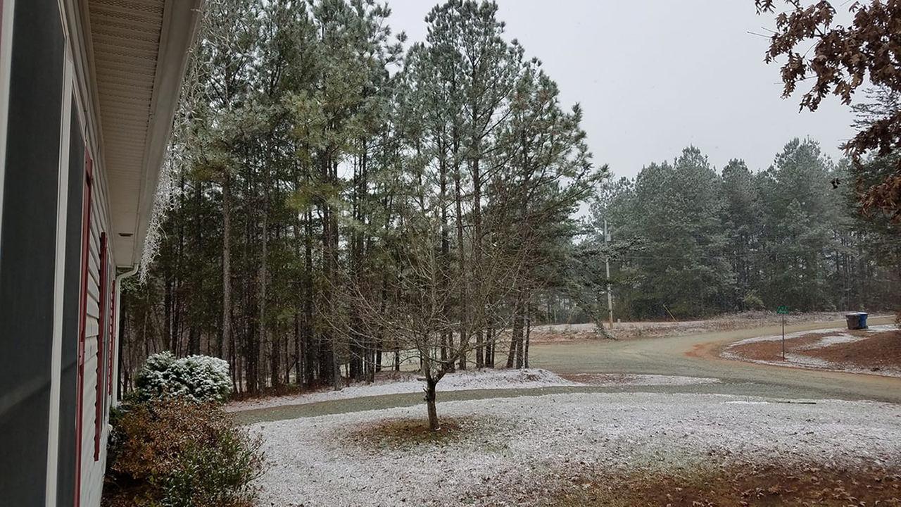 North Carolina reports more than 15,000 power outages as snow falls