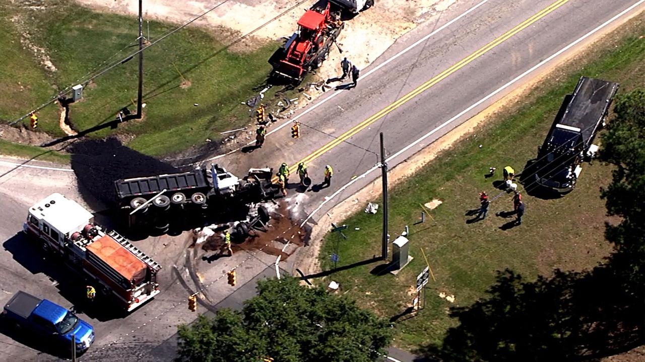 Overturned dump truck blocking traffic at Piney GroveWilbon at W