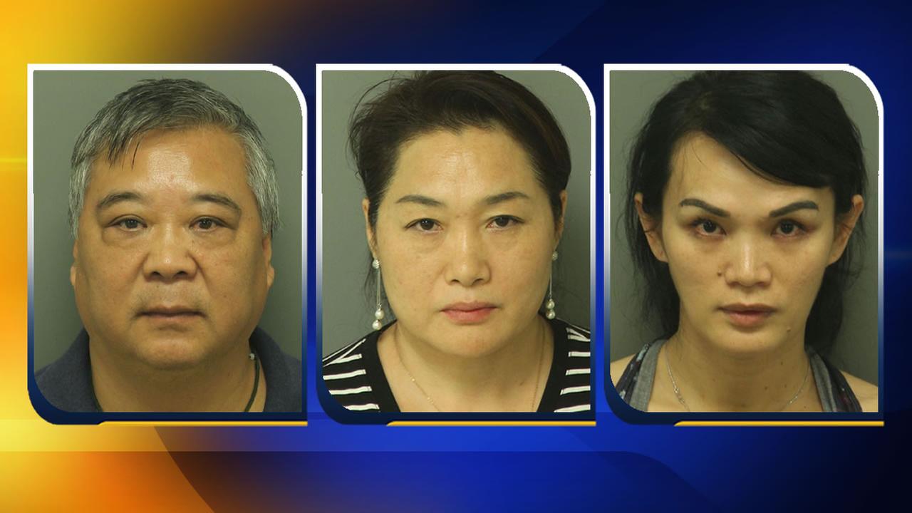 Three charged after raid at Apex massage parlor