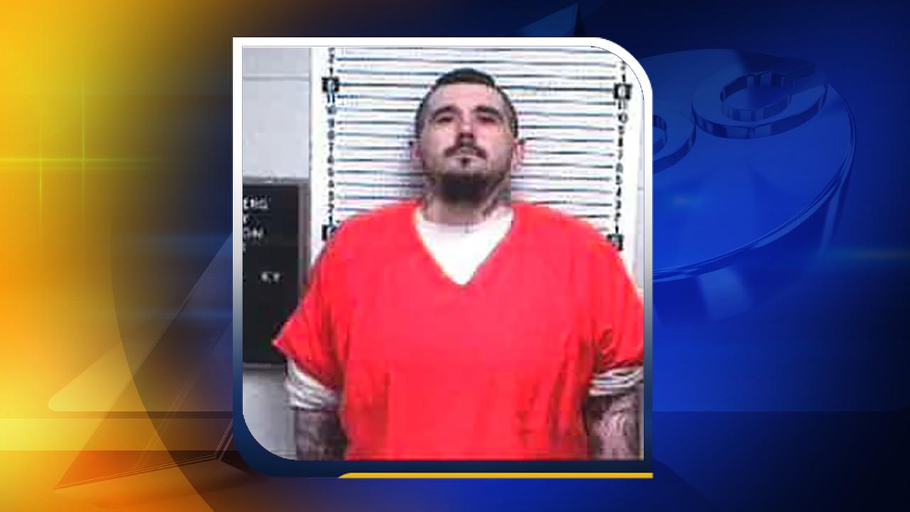 Manhunt for suspect accused of posing as police officer, killing Kentucky cop Manhunt for suspect accused of posing as police officer, killing Kentucky cop