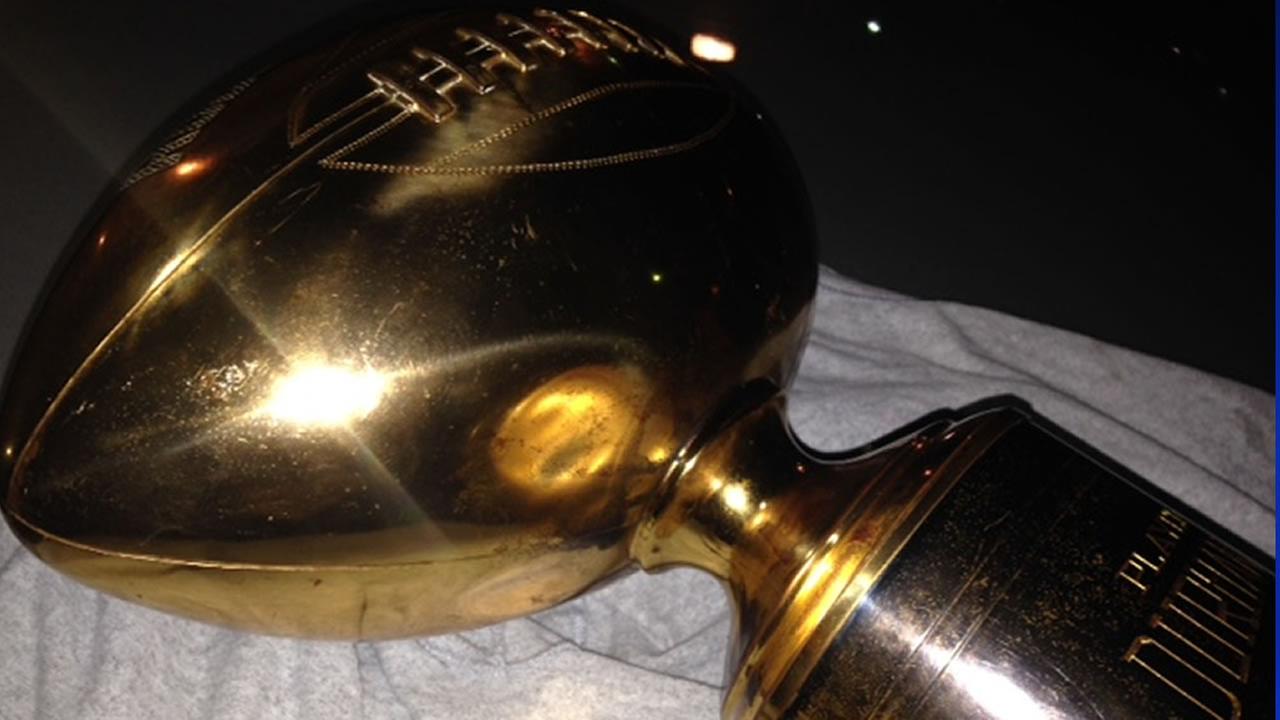Durham man finds rare Rose Bowl trophy in trash