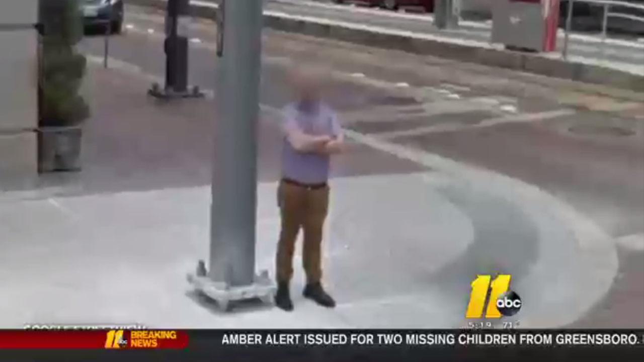 Man with wet spot on pants captured on Google Street View