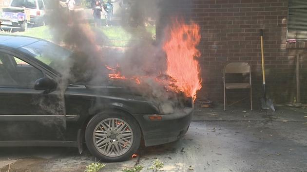 Dramatic car fire forces family from Durham home
