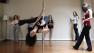 Class member Teri Jaworski performs her routine at the pole during a S Factor Workout session at the S Factor dance studio in Los Angeles, Friday, Feb. 20, 2004.