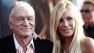 Hugh Hefner, left, and Crystal Harris arrives at the premiere of Iron Man 2 at the El Capitan Theatre in Los Angeles.