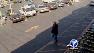 Security cameras caught a suspect and his accomplice robbing a nun in a grocery store parking lot last week.