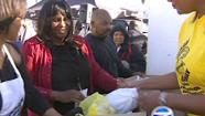Thousands line up for free Thanksgiving meal